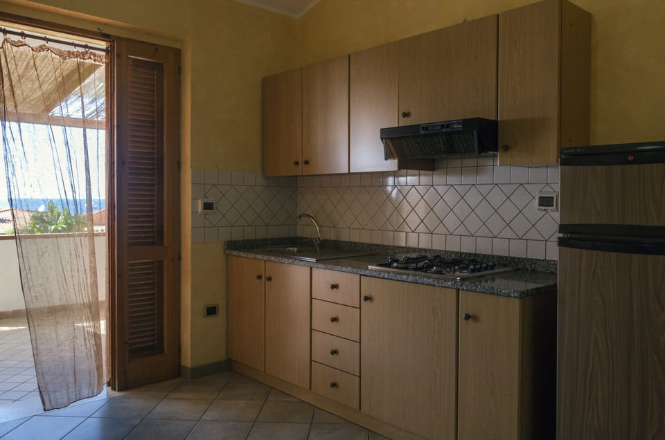 Standard Apartment, 2 Bedrooms | Private kitchen | Coffee/tea maker, electric kettle