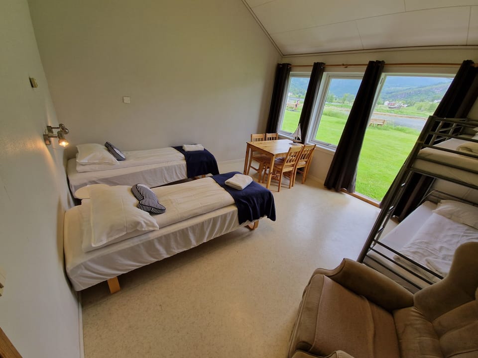Basic Quadruple Room | Blackout drapes, iron/ironing board, free cribs/infant beds, free WiFi