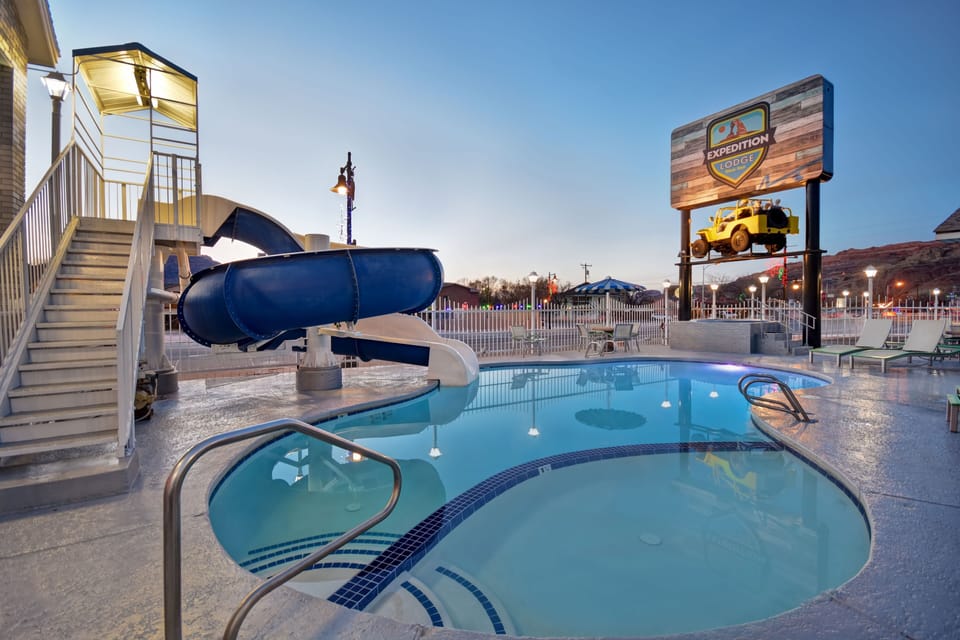 Outdoor pool, open 7:00 AM to 11:00 PM, pool umbrellas