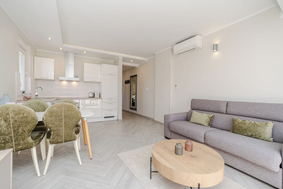 Deluxe Apartment, Balcony, Garden View | Living area | Flat-screen TV