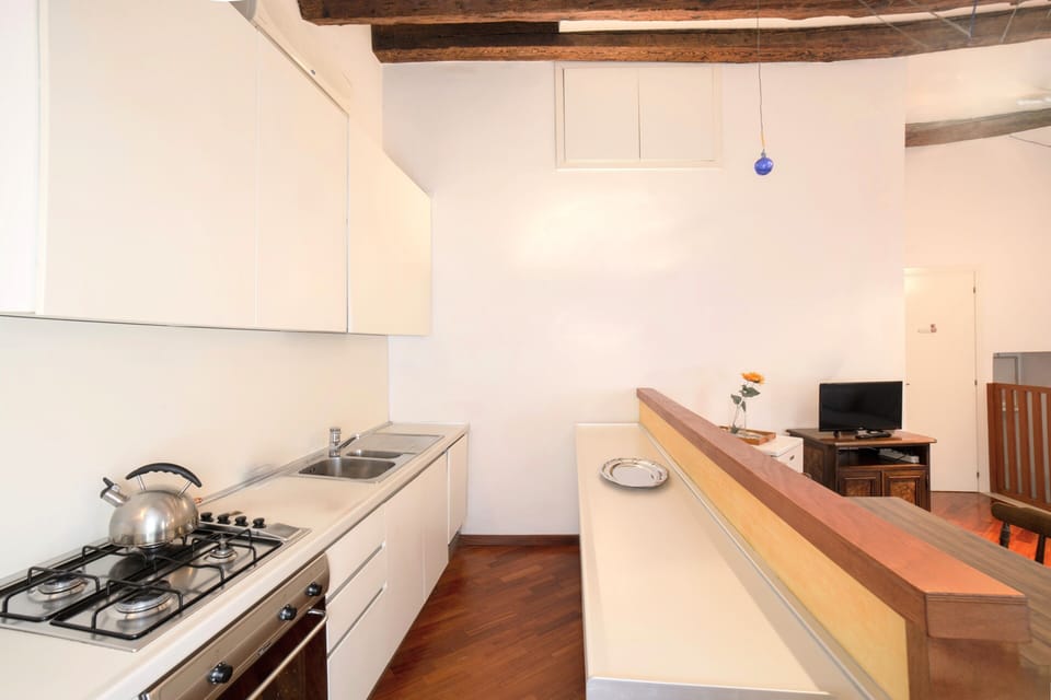 Classic Apartment, City View | Private kitchenette | Full-size fridge, oven, stovetop, dishwasher