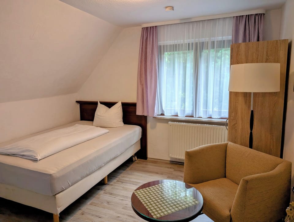 Single Room | Blackout drapes, cribs/infant beds, free WiFi, bed sheets