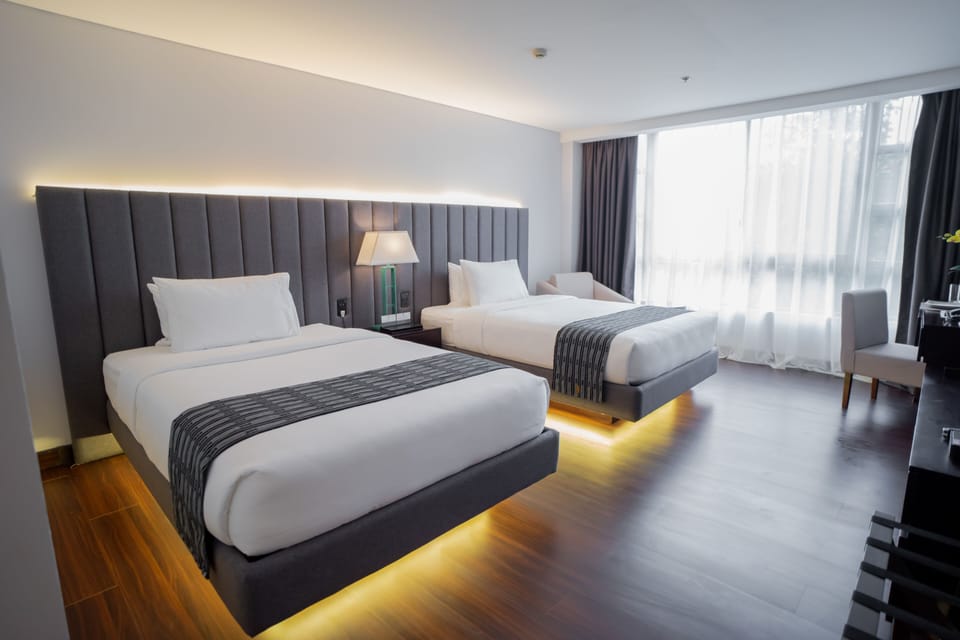 Superior Room | Minibar, desk, blackout drapes, iron/ironing board