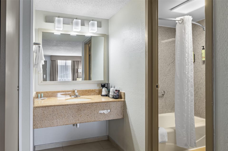 Standard Room, 2 Queen Beds, Non Smoking, Refrigerator | Bathroom | Combined shower/tub, deep soaking tub, free toiletries, hair dryer