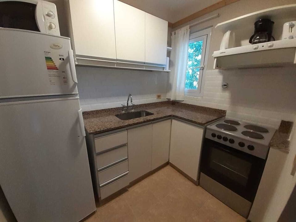 Basic Apartment, 1 Bedroom | Private kitchen | Microwave, stovetop, electric kettle, cookware/dishes/utensils