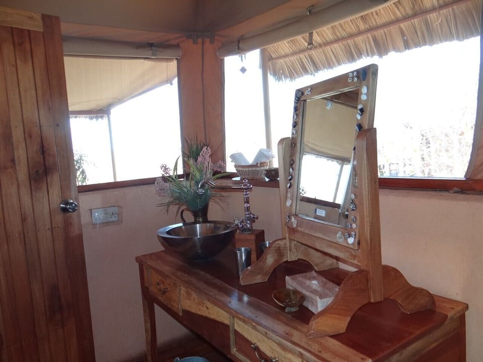 Luxury Tent, 2 Twin Beds, Private Bathroom, Garden View | Bathroom | Shower, bathrobes, slippers, towels