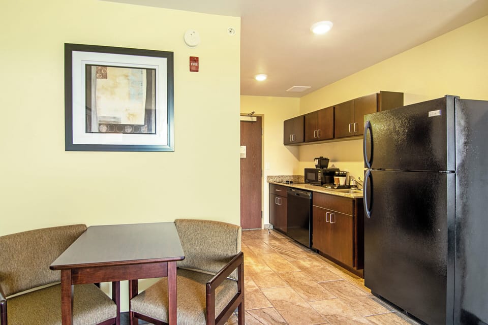 Suite, 1 King Bed, Non Smoking (Extended Stay - NO PETS) | In-room safe, desk, laptop workspace, iron/ironing board