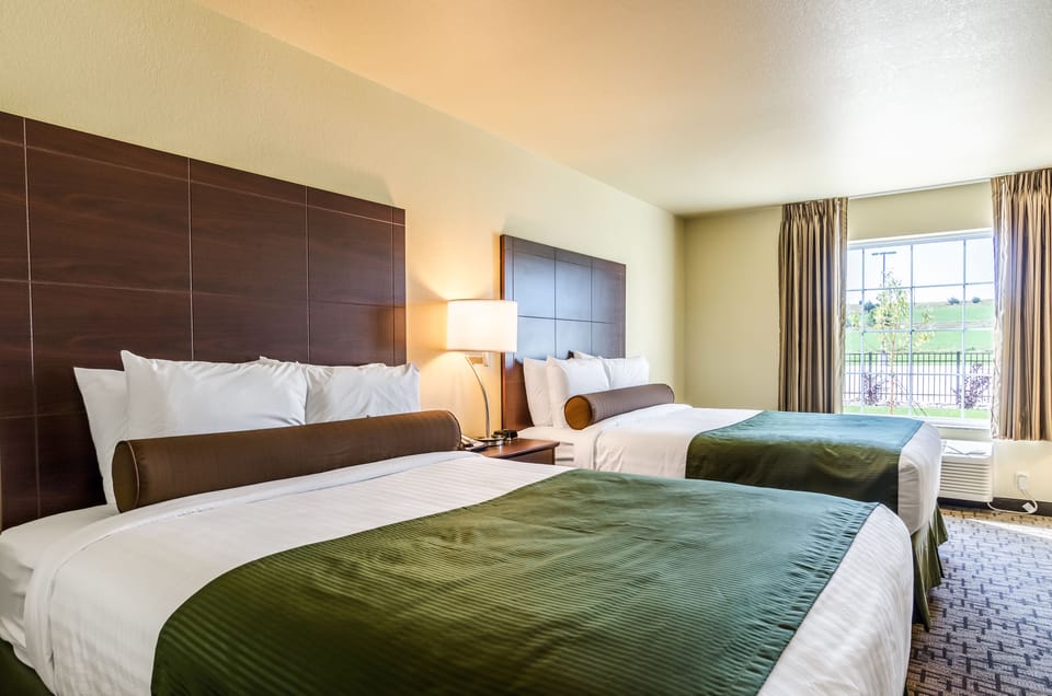 Room, 2 Queen Beds, Non Smoking | In-room safe, desk, laptop workspace, iron/ironing board