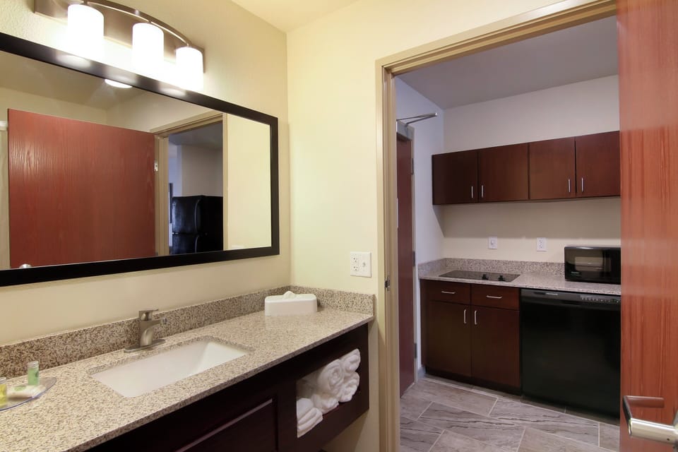 Suite, 1 King Bed with Sleeper Sofa, Non Smoking | In-room safe, desk, laptop workspace, iron/ironing board