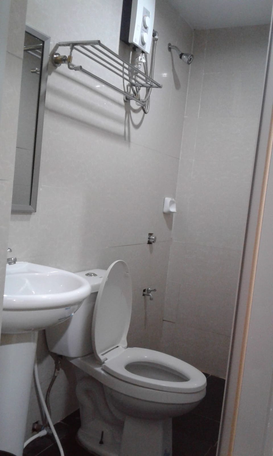Shower, free toiletries, slippers, towels