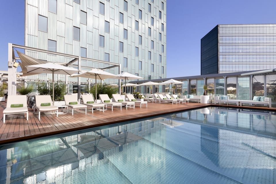 Seasonal outdoor pool, open 9 AM to 8 PM, pool umbrellas, sun loungers