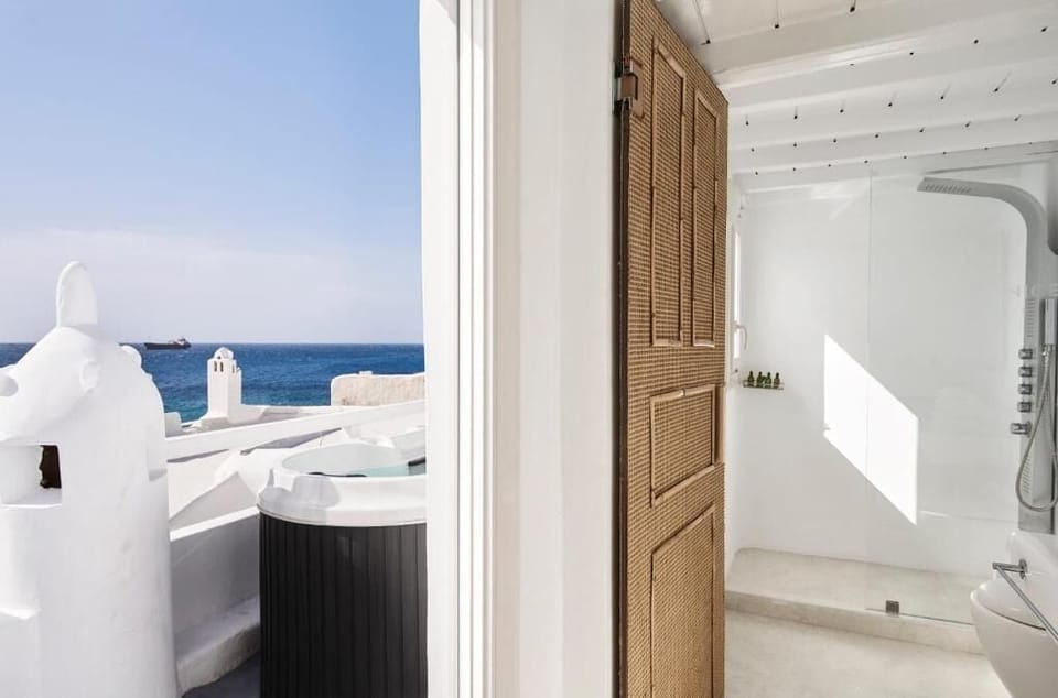 Junior Suite, Sea View (Outdoor Jetted Tub) | Premium bedding, in-room safe, soundproofing, iron/ironing board