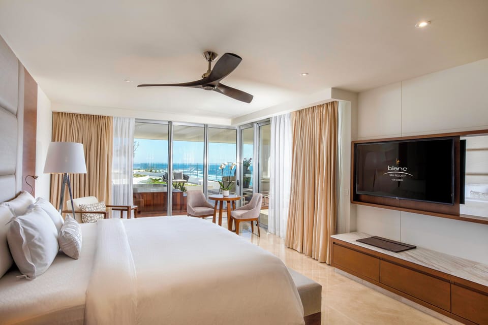 Premium bedding, down comforters, free minibar, in-room safe