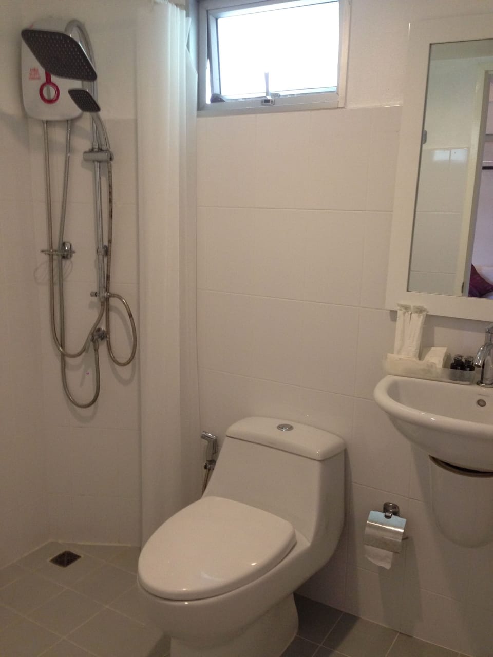 Shower, free toiletries, hair dryer, slippers