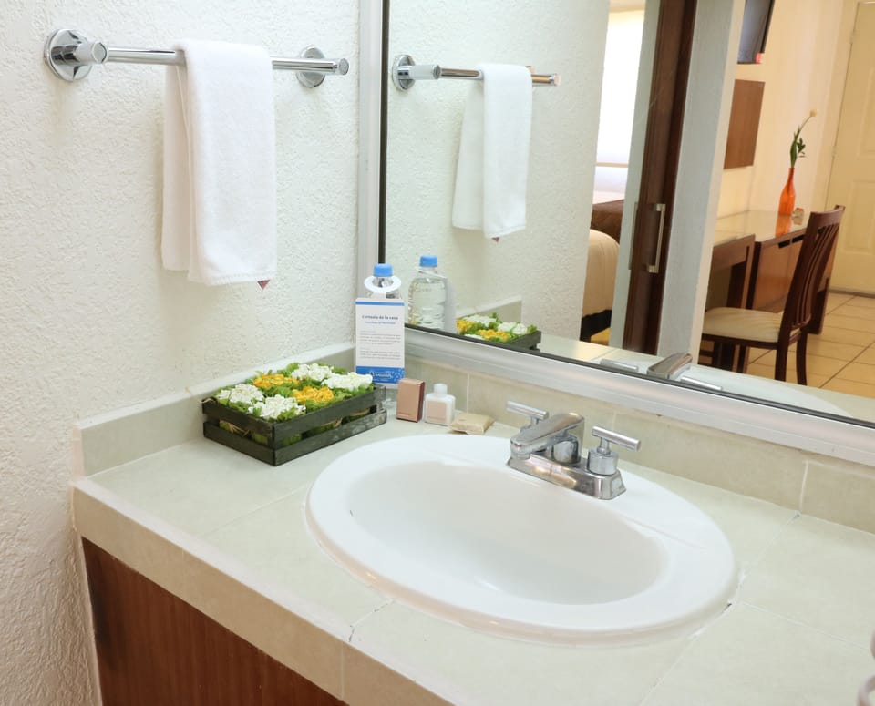 Shower, free toiletries, hair dryer, towels