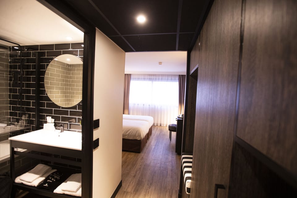 New Generation Twin Room | In-room safe, desk, laptop workspace, blackout drapes