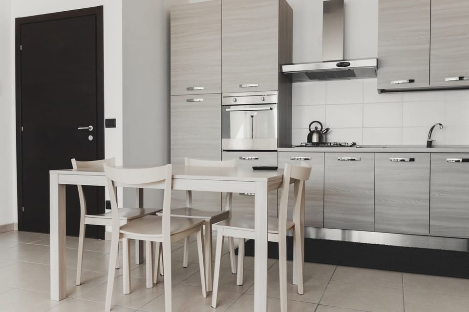Panoramic Apartment, 1 Bedroom | Private kitchen | Full-size fridge, oven, stovetop, coffee/tea maker