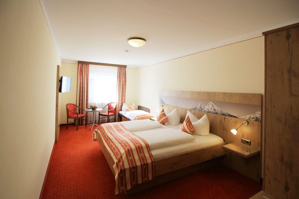 Standard Triple Room, Mountain View | In-room safe, desk, blackout drapes, cribs/infant beds