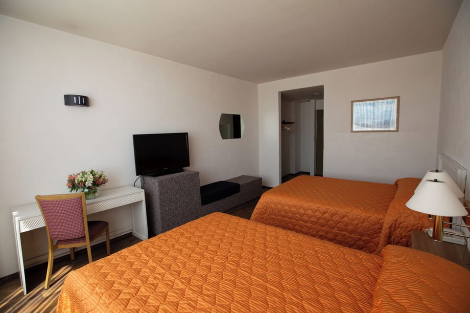 Standard Room, 2 Double Beds | Desk, iron/ironing board, free WiFi, bed sheets