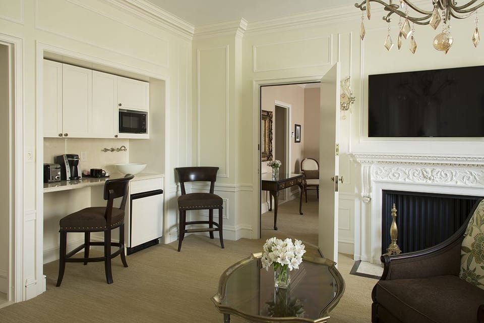 Suite, City View | Living room | 50-inch flat-screen TV with cable channels, iPod dock