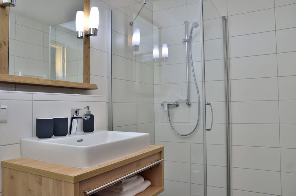 Shower, free toiletries, hair dryer, bathrobes