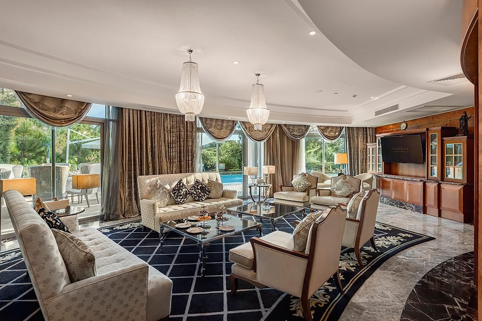 Villa Leo | Living area | 55-inch LCD TV with satellite channels, TV, foosball