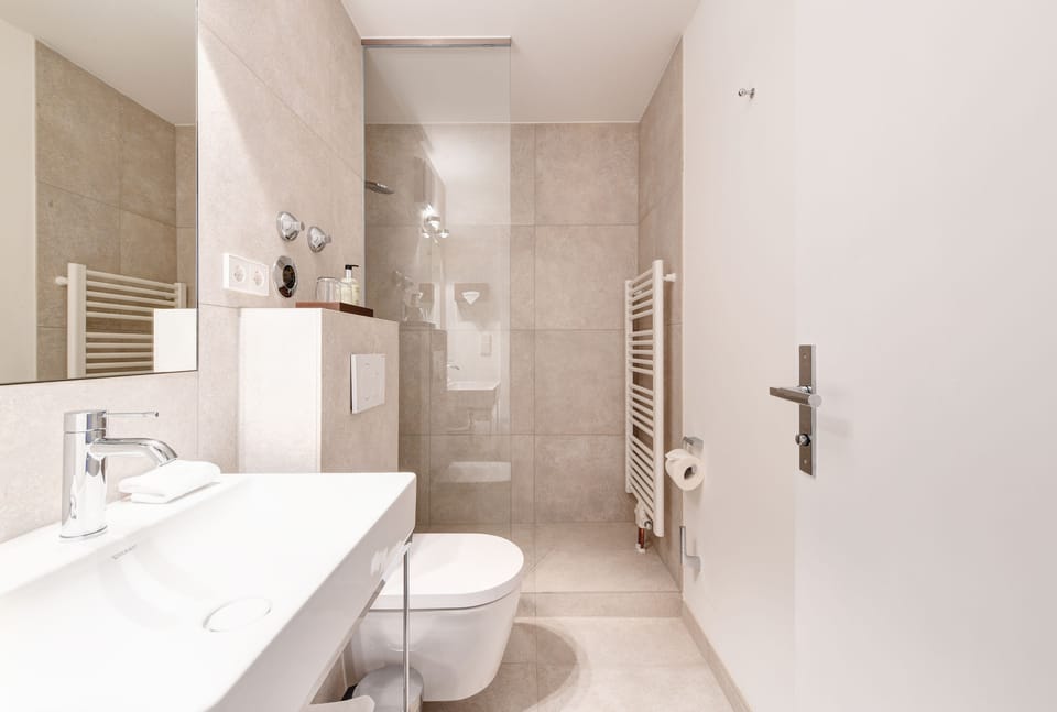Shower, hair dryer, bathrobes, slippers
