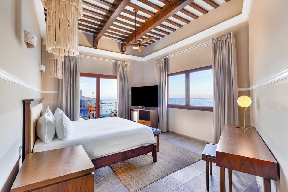 Luxury Room, 1 King Bed, Ocean View | In-room safe, individually decorated, desk, iron/ironing board