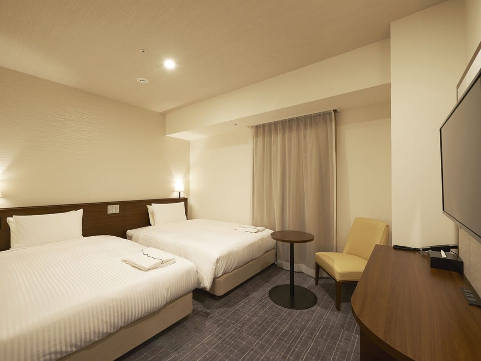 Relax Twin Room | Desk, blackout drapes, free WiFi, bed sheets