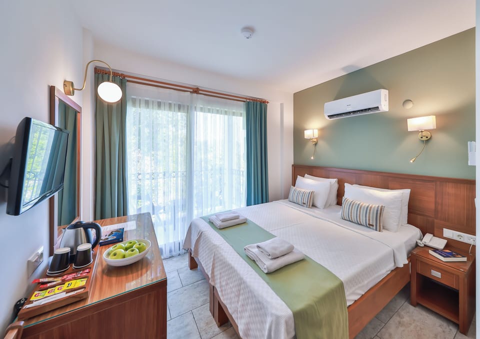 Standard Double or Twin Room, Balcony, Sea View | Minibar, desk, laptop workspace, blackout drapes