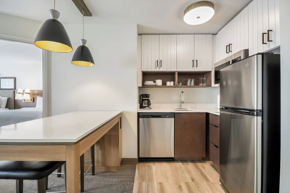 Suite, 1 Bedroom, Kitchen | In-room safe, desk, blackout drapes, iron/ironing board