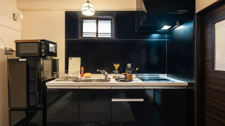 Japanese Style Townhouse | Private kitchen | Fridge, microwave, stovetop, electric kettle