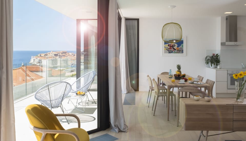 Elite Three Bedroom Apartment with spectacular Sea View and Balcony | Living area | Flat-screen TV