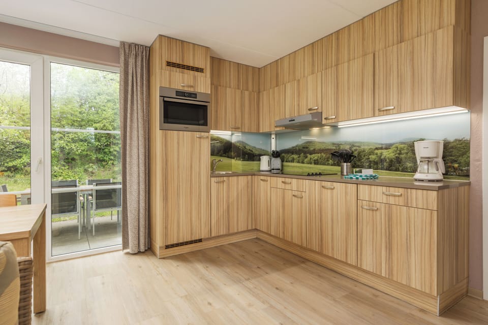 Premium Cottage, 4 Bedrooms | Private kitchen | Fridge, microwave, stovetop, coffee/tea maker