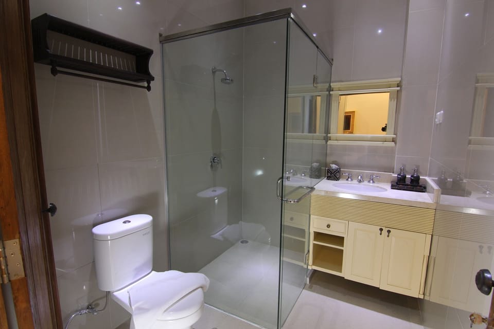 Shower, free toiletries, slippers, towels