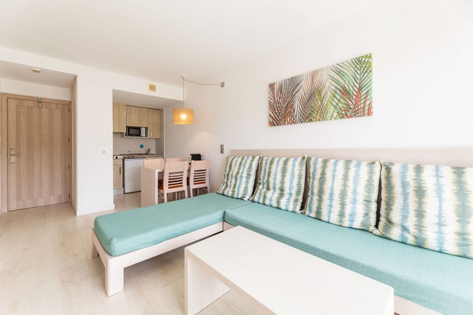 Premium One Bedroom Apartment Private Garden& Hydro | Living area | Flat-screen TV