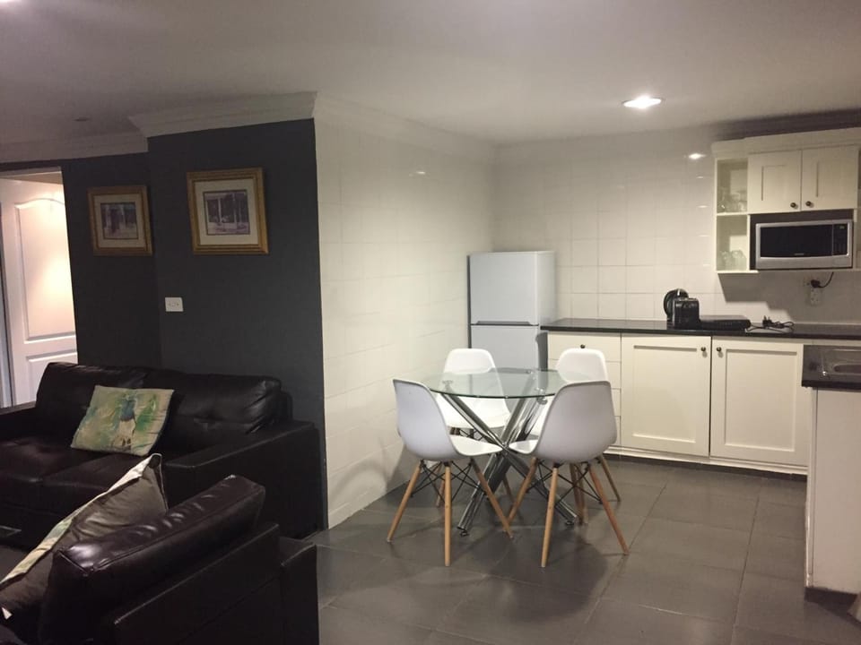 Fridge, coffee/tea maker, electric kettle, cookware/dishes/utensils