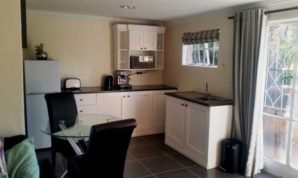 Family Suite, Garden View | Private kitchen | Fridge, coffee/tea maker, electric kettle, cookware/dishes/utensils