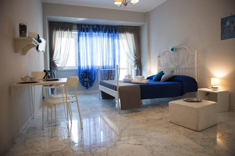 Classic Room, Private Bathroom (External) | Down comforters, desk, free WiFi, bed sheets