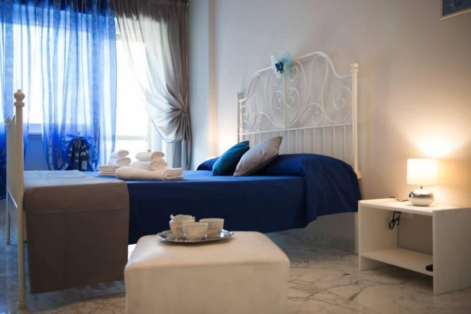 Classic Room, Private Bathroom (External) | Down comforters, desk, free WiFi, bed sheets