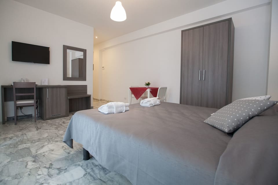 Triple Room | Premium bedding, minibar, in-room safe, individually decorated
