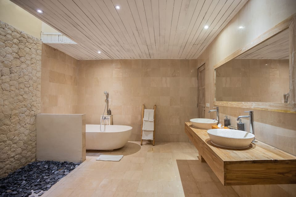 Separate tub and shower, free toiletries, hair dryer, slippers