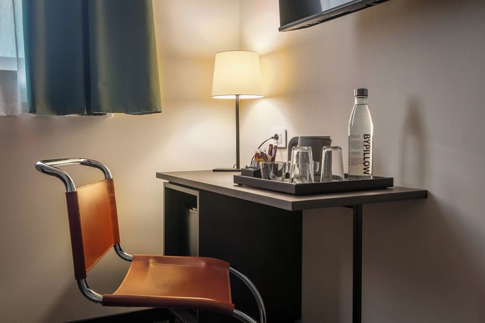 Hypo-allergenic bedding, minibar, desk, blackout drapes