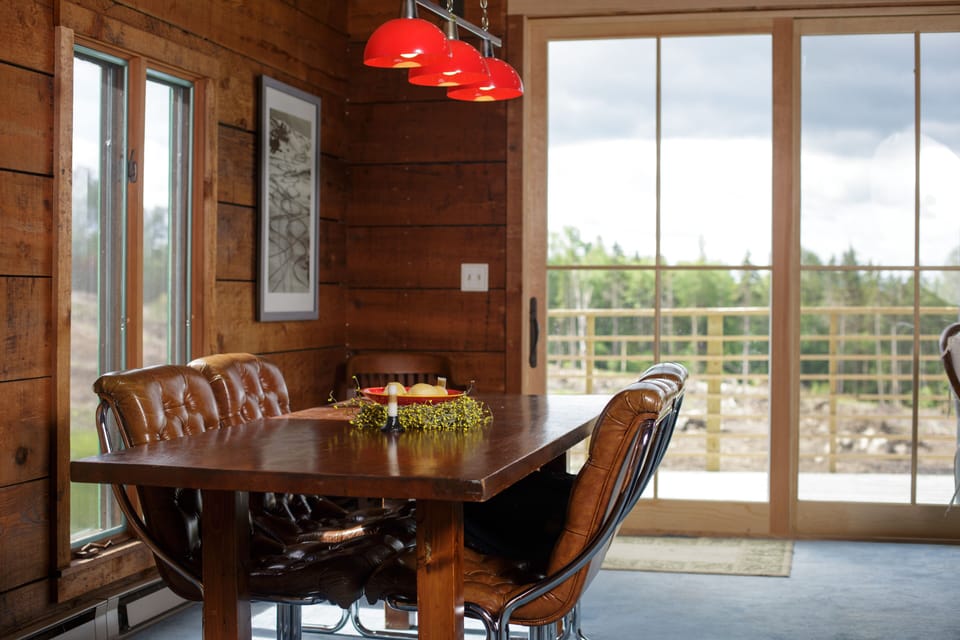 Large dining room table for meals, or more space for reading and puzzles.