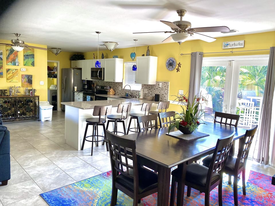 Fully stocked kitchen area , French doors to patio off of dining area