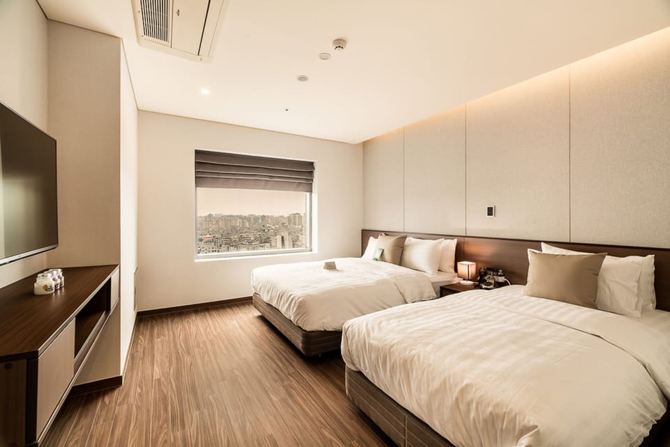 Suite (Wonderful) | Premium bedding, down comforters, desk, blackout drapes
