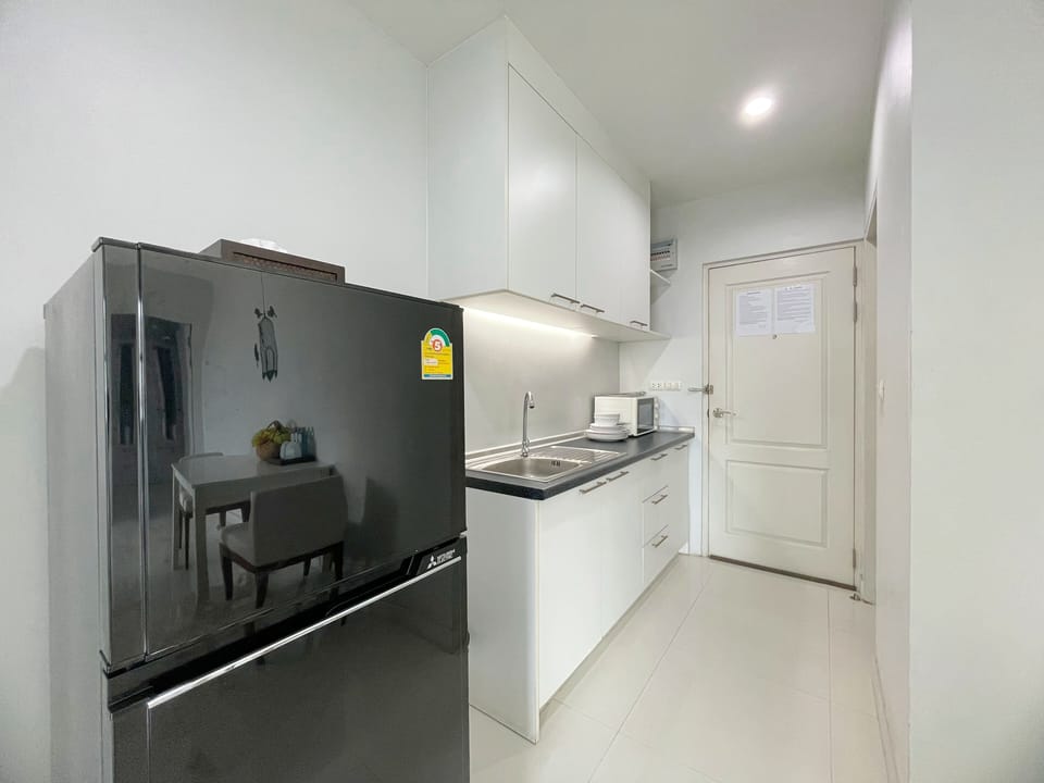 Family Room, 2 Bedrooms, Partial Sea View | In-room safe, individually decorated, individually furnished, desk