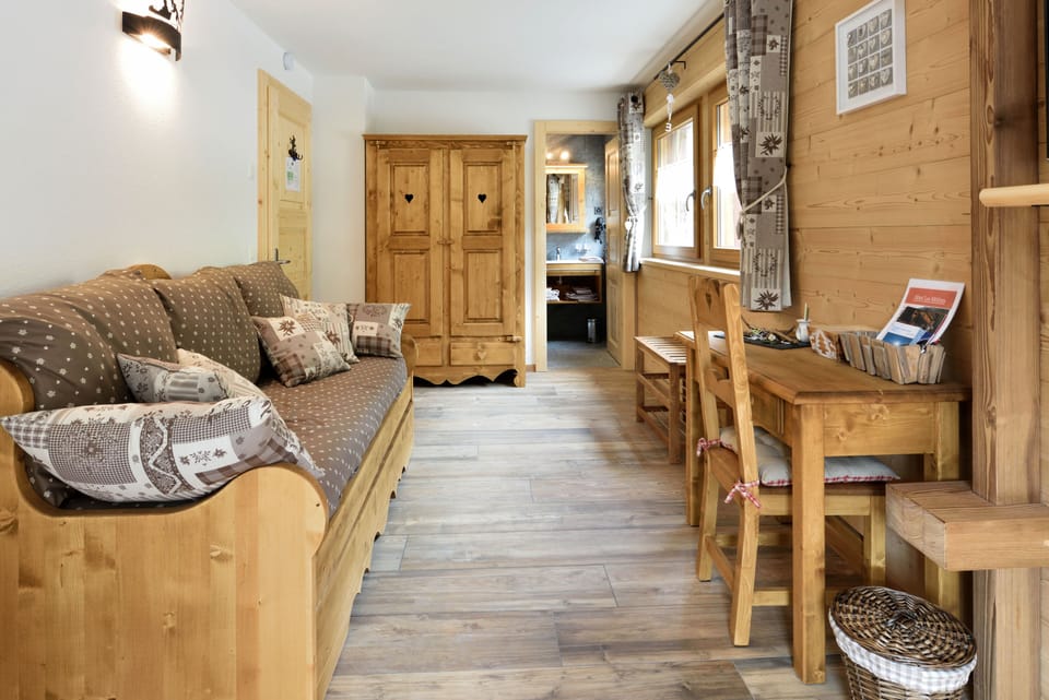 Deluxe Double Room, Balcony | Living area | Flat-screen TV