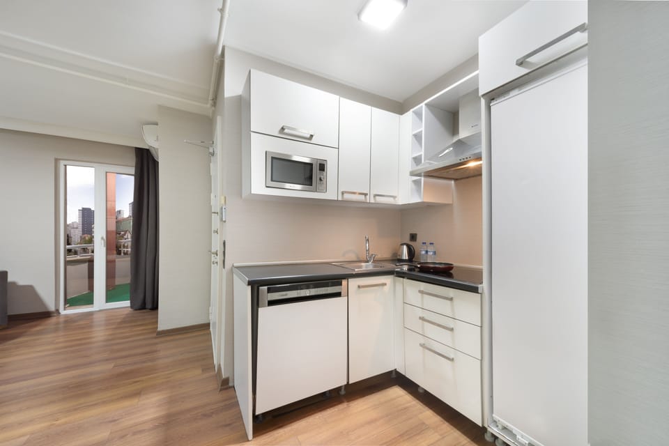 Superior Suite, 1 Bedroom, Balcony | In-room safe, desk, blackout drapes, soundproofing