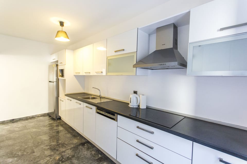 Deluxe Condo, 3 Bedrooms | In-room safe, desk, blackout drapes, soundproofing